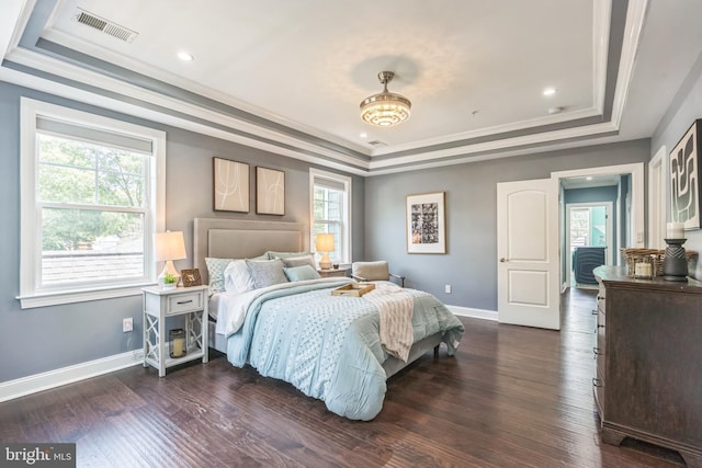 3112 Lancer Dr, Hyattsville, MD 20782 - bedroom featuring a tray ceiling, crown molding, dark wood finished floors, and recessed lighting