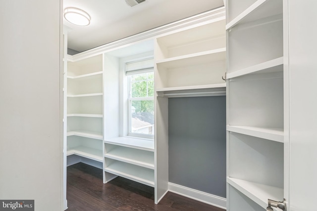 3112 Lancer Dr, Hyattsville, MD 20782 - walk in closet with dark wood-type flooring