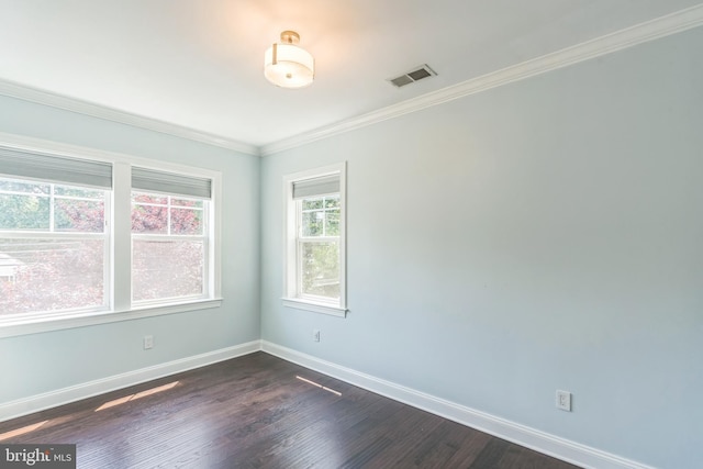 3112 Lancer Dr, Hyattsville, MD 20782 - spare room featuring dark wood-style flooring and crown molding