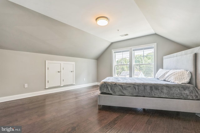 3112 Lancer Dr, Hyattsville, MD 20782 - bedroom featuring lofted ceiling and dark wood-type flooring