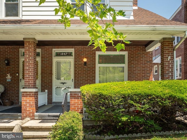 1947 Fairview Ave, Reading, PA 19606 - doorway to property with covered porch and brick siding