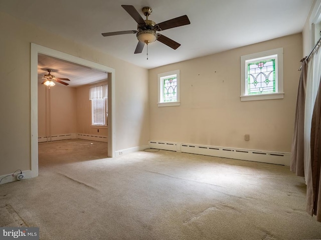 1947 Fairview Ave, Reading, PA 19606 - carpeted spare room featuring baseboard heating, a ceiling fan, and baseboards