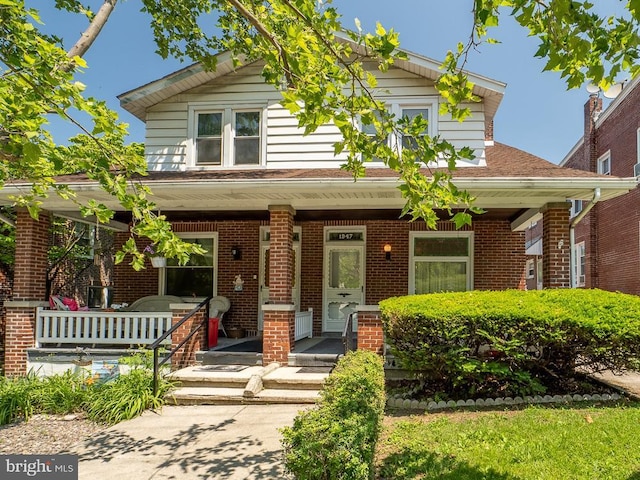 1947 Fairview Ave, Reading, PA 19606 - view of front facade featuring covered porch and brick siding
