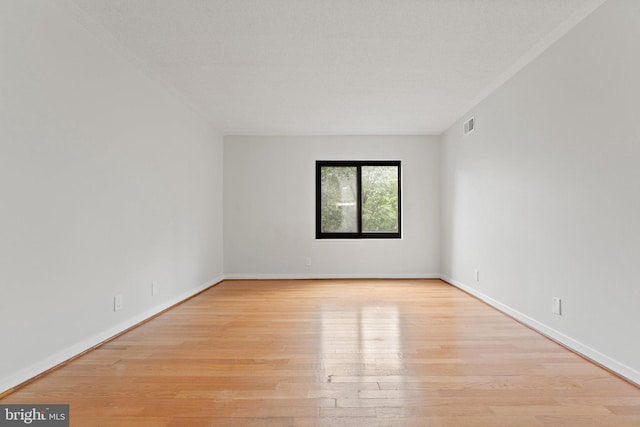 203 Yoakum Pkwy Unit 603, Alexandria, VA 22304 - empty room featuring wood finished floors and baseboards
