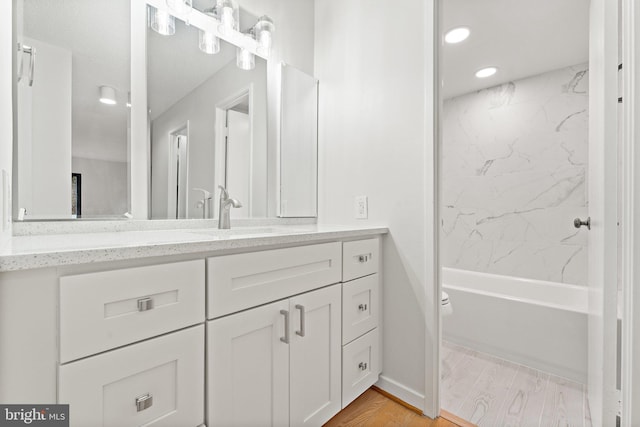 203 Yoakum Pkwy Unit 603, Alexandria, VA 22304 - full bathroom with vanity, wood finished floors, toilet, shower / bathtub combination, and recessed lighting