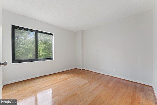 203 Yoakum Pkwy Unit 603, Alexandria, VA 22304 - empty room featuring wood finished floors and baseboards