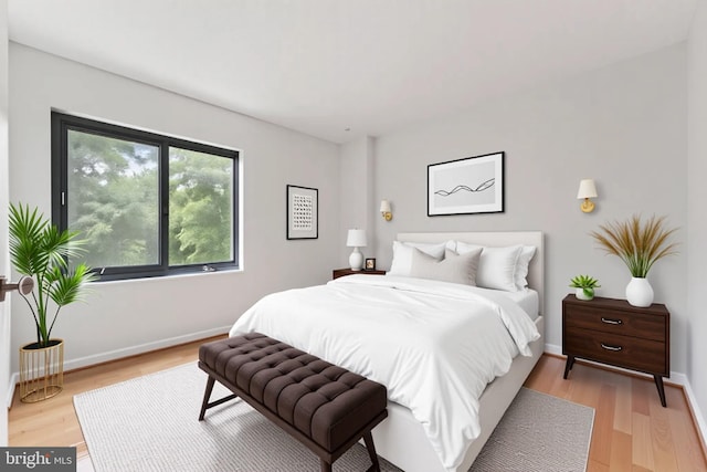203 Yoakum Pkwy Unit 603, Alexandria, VA 22304 - bedroom featuring light wood-style flooring and baseboards