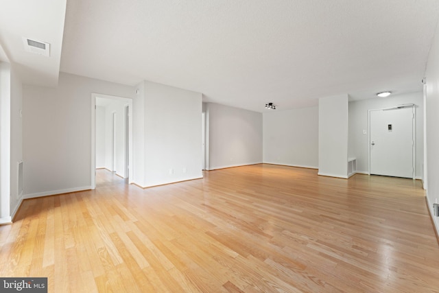 203 Yoakum Pkwy Unit 603, Alexandria, VA 22304 - empty room featuring light wood finished floors and baseboards