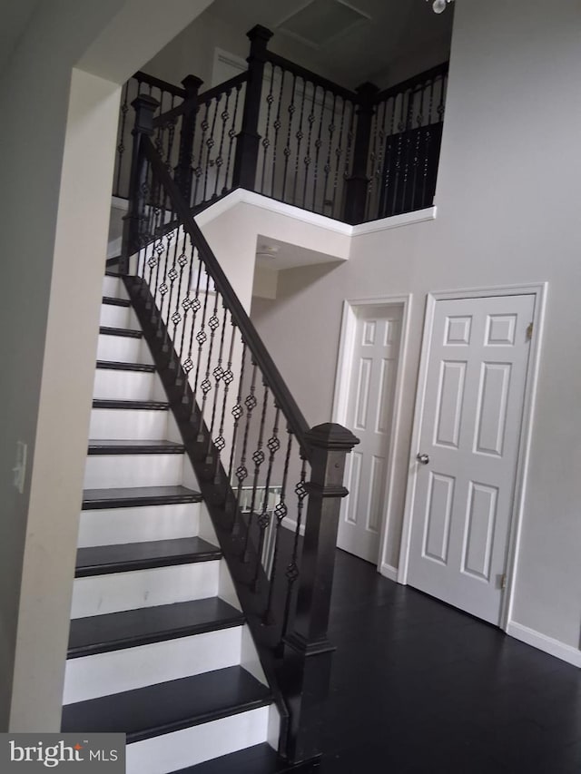 13017 Broadmore, Silver Spring, MD 20904 - stairway with baseboards and a towering ceiling