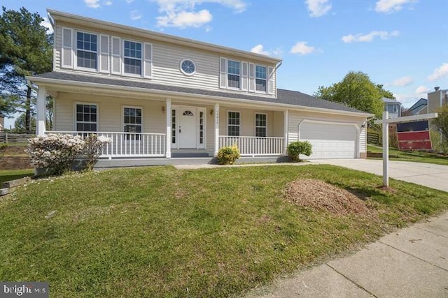 13017 Broadmore, Silver Spring, MD 20904 - colonial-style house featuring concrete driveway, a porch, a garage, and a front yard
