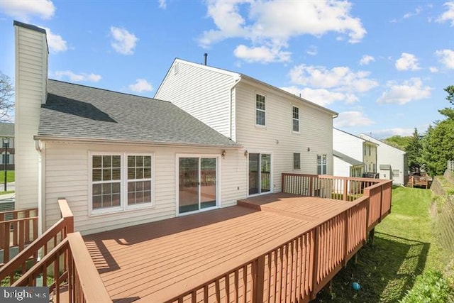 13017 Broadmore, Silver Spring, MD 20904 - back of house with a chimney, a deck, a yard, and roof with shingles