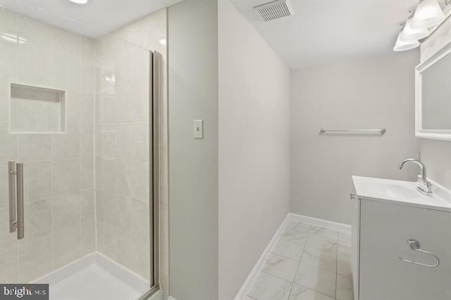 13017 Broadmore, Silver Spring, MD 20904 - bathroom with marble look tile flooring, vanity, a stall shower, and baseboards