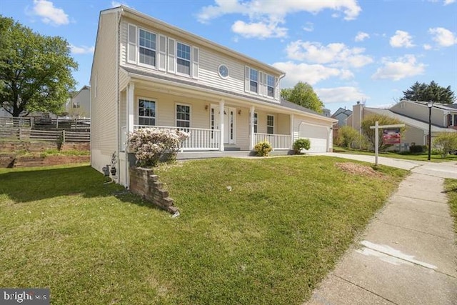 13017 Broadmore, Silver Spring, MD 20904 - colonial-style house featuring covered porch, concrete driveway, and a garage