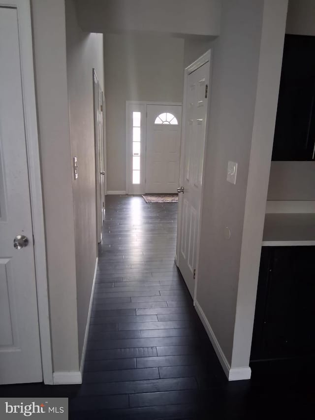 13017 Broadmore, Silver Spring, MD 20904 - corridor featuring baseboards and dark wood-style flooring