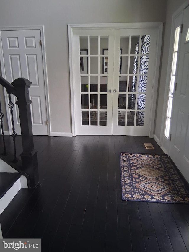 13017 Broadmore, Silver Spring, MD 20904 - foyer entrance with hardwood / wood-style floors, french doors, baseboards, and stairway