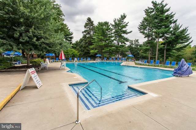 212 Old Forge Xing, Devon, PA 19333 - community pool featuring a patio area and view of scattered trees