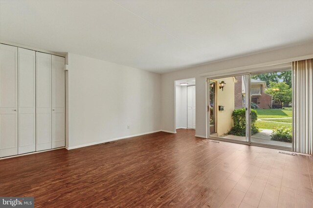212 Old Forge Xing, Devon, PA 19333 - unfurnished living room with wood finished floors and baseboards
