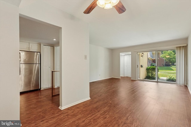 212 Old Forge Xing, Devon, PA 19333 - unfurnished living room with a ceiling fan and dark wood-style floors