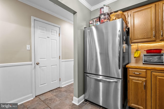 48 Deer Run Rd, Perkasie, PA 18944 - kitchen featuring freestanding refrigerator, ornamental molding, decorative backsplash, brown cabinetry, and light countertops
