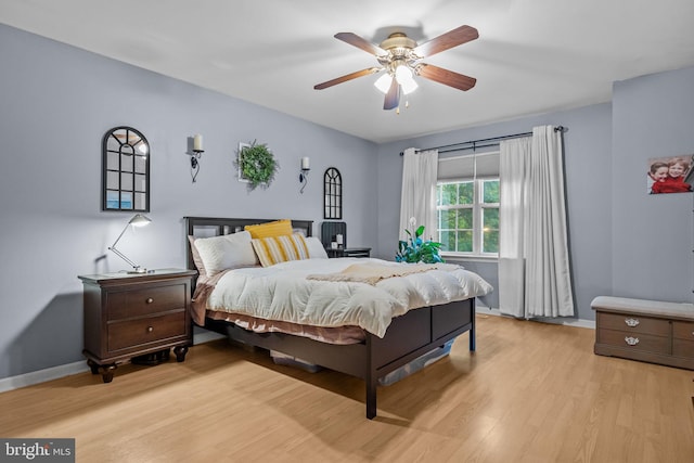 48 Deer Run Rd, Perkasie, PA 18944 - bedroom featuring light wood-style flooring, baseboards, and a ceiling fan