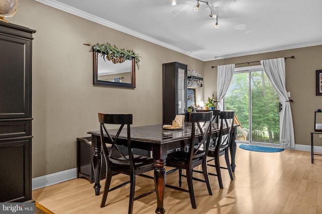 48 Deer Run Rd, Perkasie, PA 18944 - dining space with light wood-type flooring, ornamental molding, and baseboards