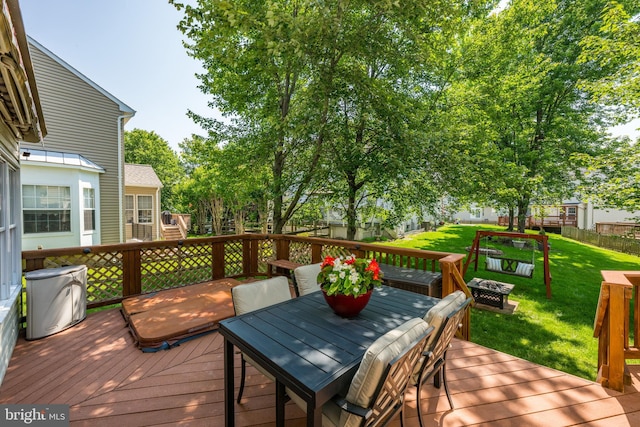 18722 Timoney Ct, Leesburg, VA 20176 - wooden deck with a yard and outdoor dining space