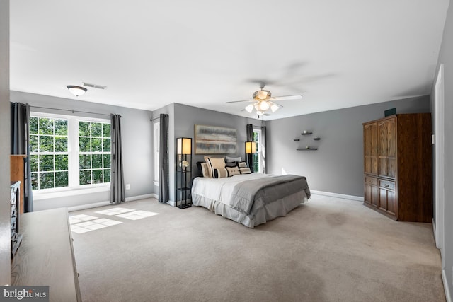 18722 Timoney Ct, Leesburg, VA 20176 - bedroom featuring light carpet, baseboards, and ceiling fan
