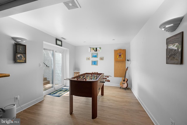 18722 Timoney Ct, Leesburg, VA 20176 - playroom featuring light wood-style floors and baseboards
