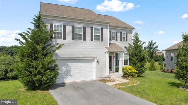 100 Taylor Ct, Stephenson, VA 22656 - view of front of property featuring asphalt driveway, an attached garage, and a front yard