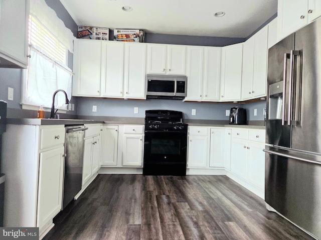 34 Springfield Cir, Middletown, DE 19709 - kitchen with appliances with stainless steel finishes, white cabinetry, dark wood-type flooring, and recessed lighting