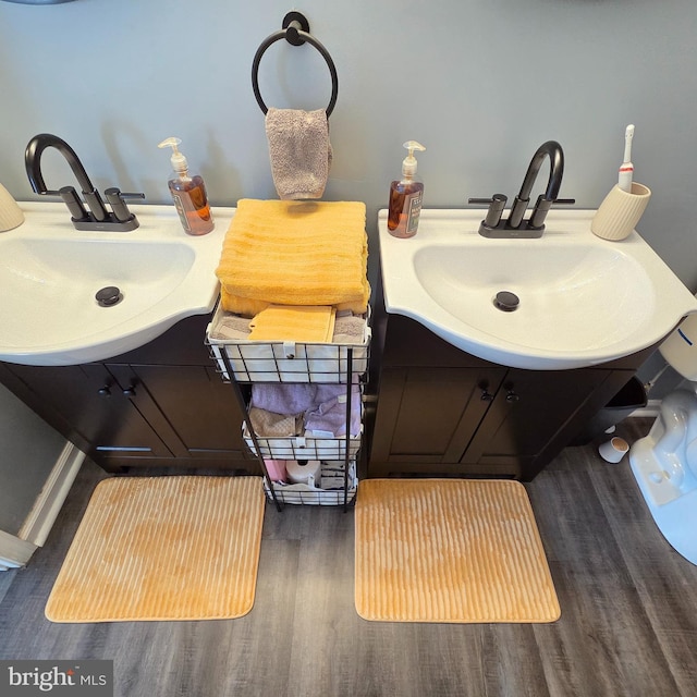34 Springfield Cir, Middletown, DE 19709 - bathroom featuring wood finished floors and vanity