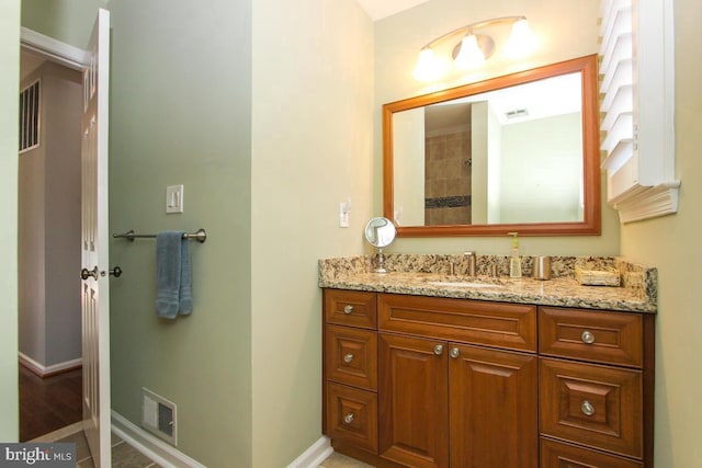 11409 Flints Grove Ln, North Potomac, MD 20878 - full bath with vanity, baseboards, and a shower