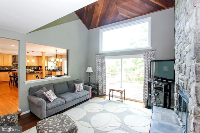 11409 Flints Grove Ln, North Potomac, MD 20878 - living area featuring a chandelier, wood finished floors, and high vaulted ceiling