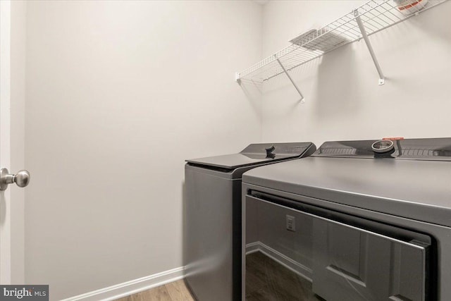 890 Shadows Dr, Front Royal, VA 22630 - laundry room featuring independent washer and dryer and wood finished floors