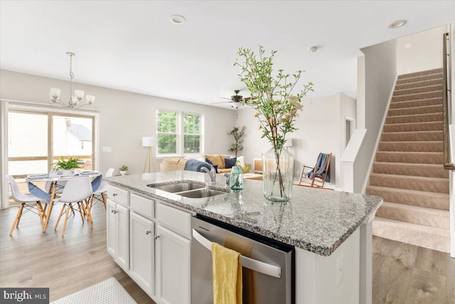 890 Shadows Dr, Front Royal, VA 22630 - kitchen featuring dishwasher, light wood finished floors, open floor plan, ceiling fan, and a center island with sink