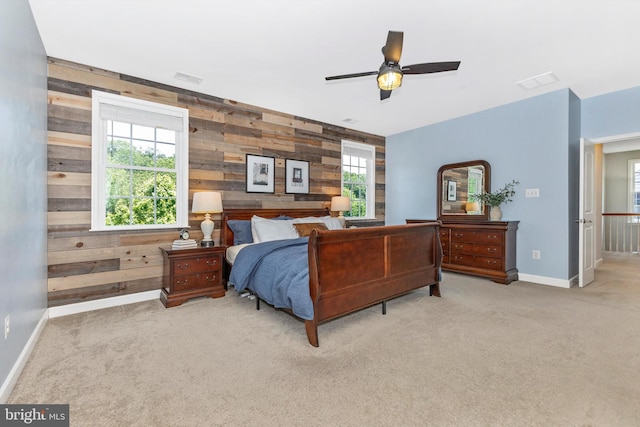 2304 Kings Forest Trl, Mount Airy, MD 21771 - bedroom featuring wood walls, carpet, and multiple windows