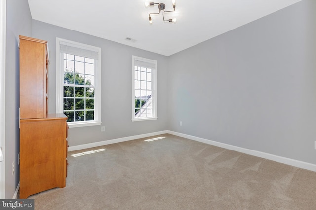 2304 Kings Forest Trl, Mount Airy, MD 21771 - carpeted spare room featuring baseboards and a chandelier
