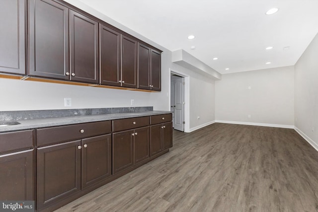 2304 Kings Forest Trl, Mount Airy, MD 21771 - kitchen featuring light wood-style floors, dark brown cabinets, and recessed lighting