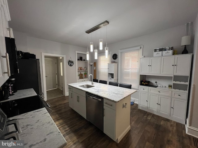 713 Juniper St, Quakertown, PA 18951 - kitchen featuring appliances with stainless steel finishes, a sink, dark wood-style floors, and white cabinetry