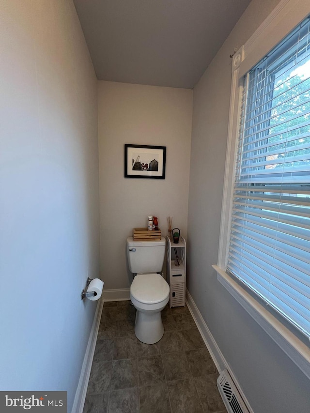 713 Juniper St, Quakertown, PA 18951 - bathroom featuring toilet and baseboards