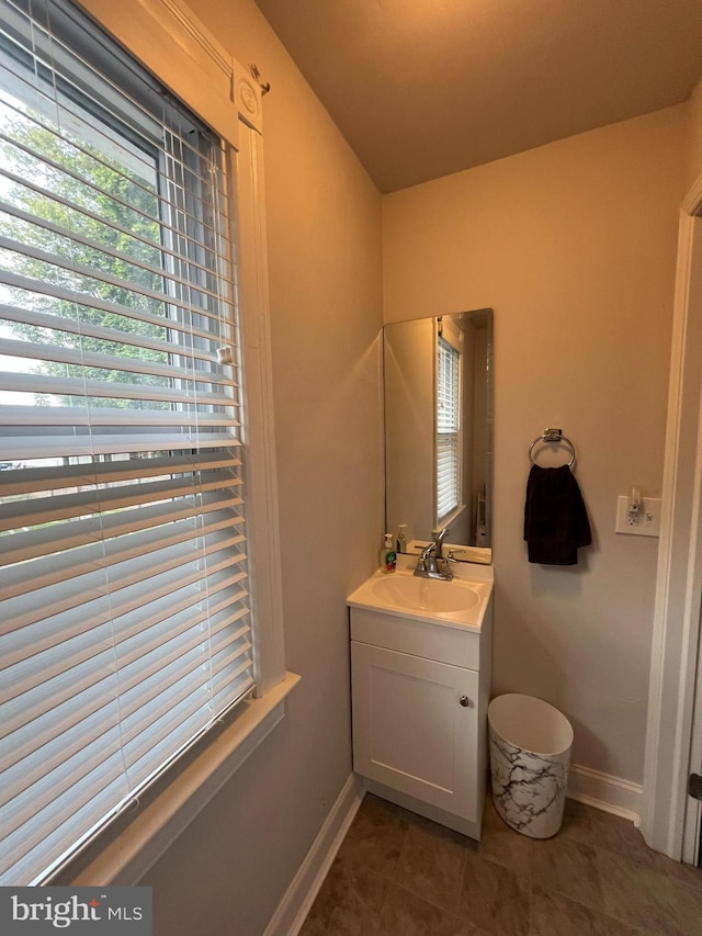 713 Juniper St, Quakertown, PA 18951 - bathroom with vanity, baseboards, and tile patterned floors