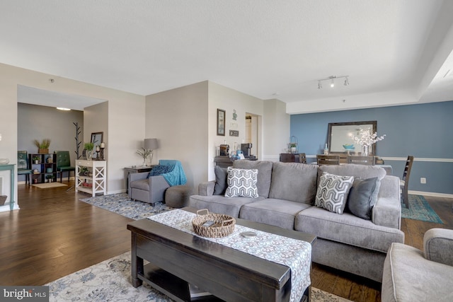 3713 S George Mason Dr Unit 713, Falls Church, VA 22041 - living area featuring dark wood finished floors and baseboards