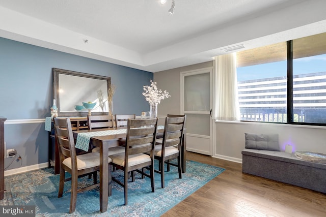 3713 S George Mason Dr Unit 713, Falls Church, VA 22041 - dining area featuring baseboards and wood finished floors