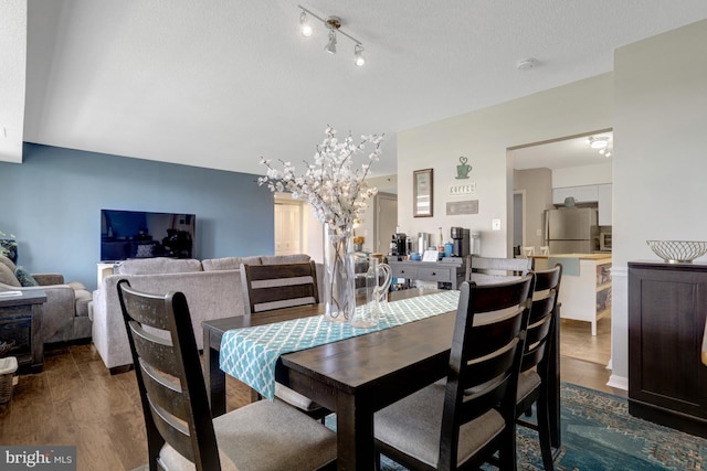 3713 S George Mason Dr Unit 713, Falls Church, VA 22041 - dining area with dark wood-style flooring and a chandelier
