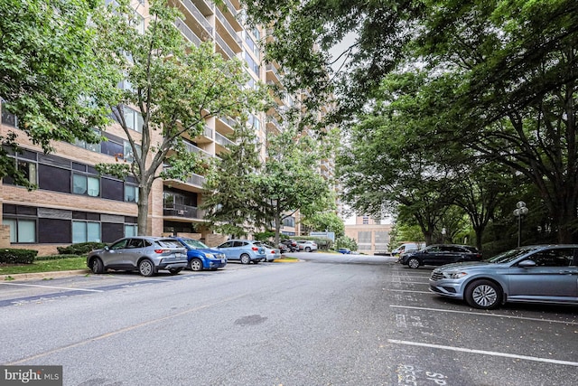 3713 S George Mason Dr Unit 713, Falls Church, VA 22041 - view of asphalt road featuring curbs and street lighting