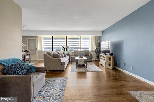 3713 S George Mason Dr Unit 713, Falls Church, VA 22041 - living area featuring wood finished floors and baseboards