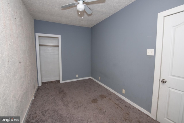4225 Tackawanna St, Philadelphia, PA 19124 - unfurnished bedroom featuring carpet flooring, a textured ceiling, baseboards, a closet, and a ceiling fan