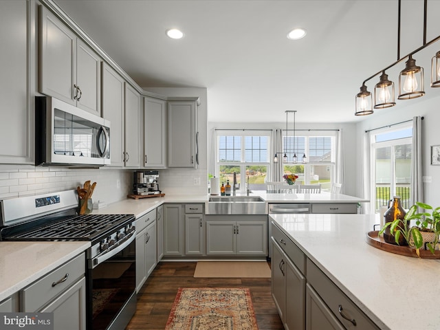 104 Barrister St, Stephenson, VA 22656 - kitchen with stainless steel appliances, gray cabinetry, a sink, healthy amount of natural light, and recessed lighting
