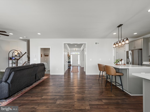 104 Barrister St, Stephenson, VA 22656 - living area featuring dark wood-style floors, stairway, baseboards, recessed lighting, and a ceiling fan
