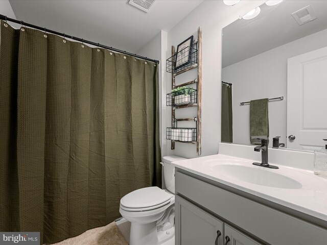104 Barrister St, Stephenson, VA 22656 - bathroom with toilet, vanity, and tile patterned floors